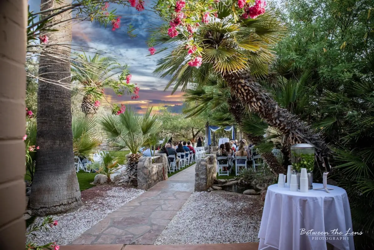 Wedding altar decorated with blooming flowers at Oasis at Wild Horse Ranch, Tucson AZ venue decor